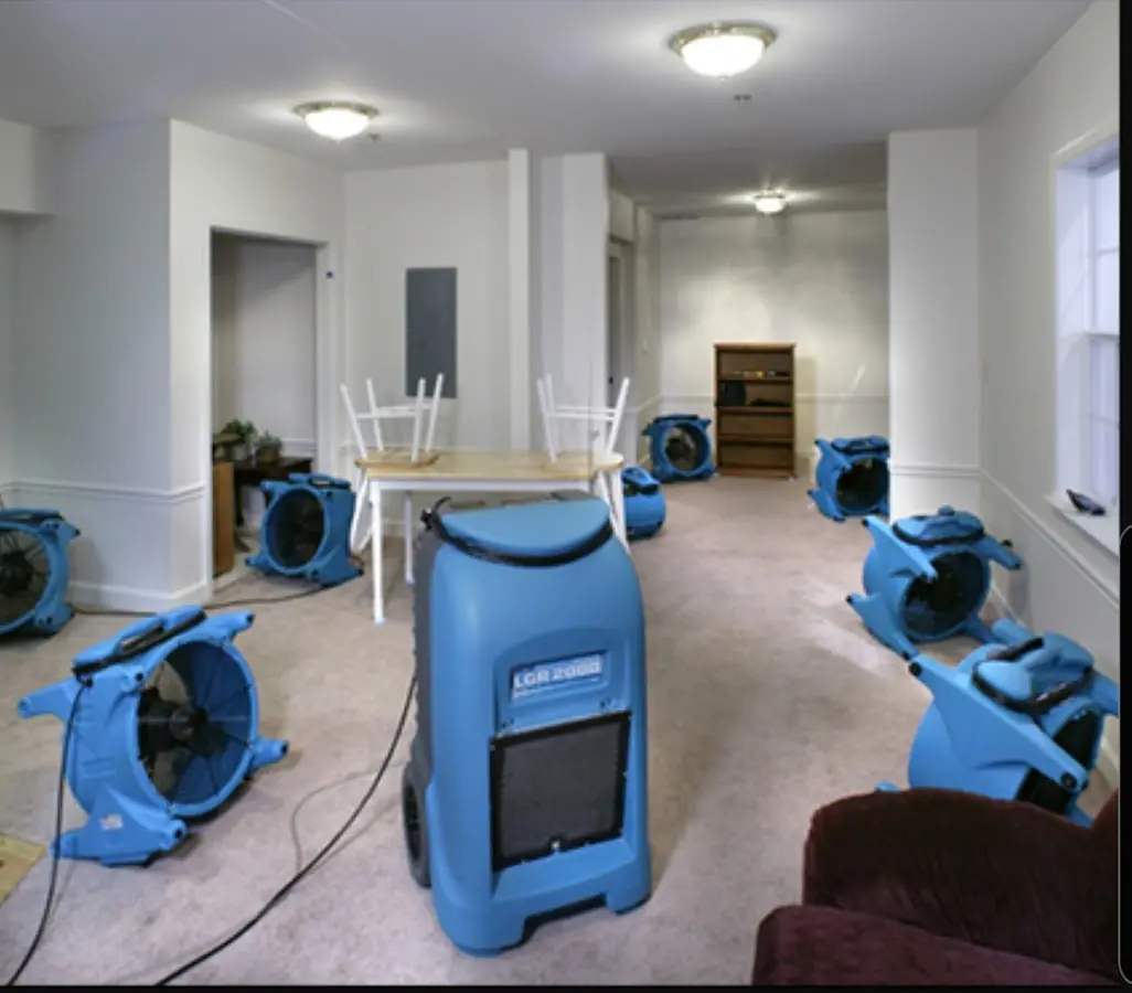 Air movers and dehumidifier setup for Water Damage Restoration in Galveston